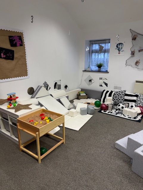 Monochrome sensory play area set up for babies in The Baby Barn