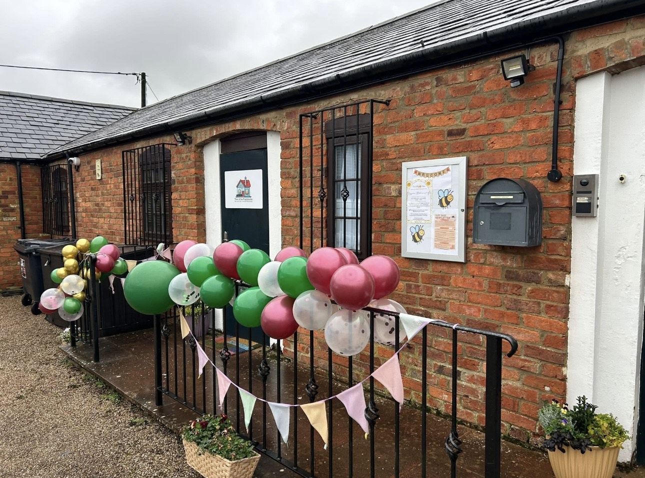 Balloon arch and bunting at The Baby Barn opening
