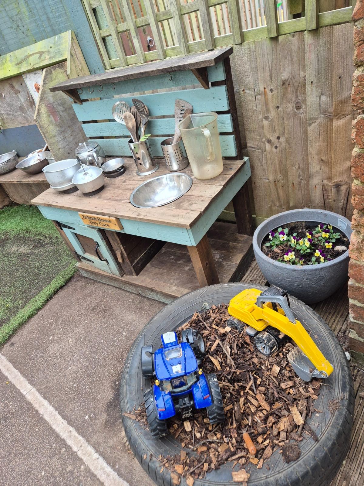 Mud kitchen and digger play in the School House garden