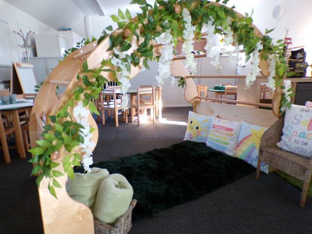 The reading arch and cosy corner where new families start their settle sessions