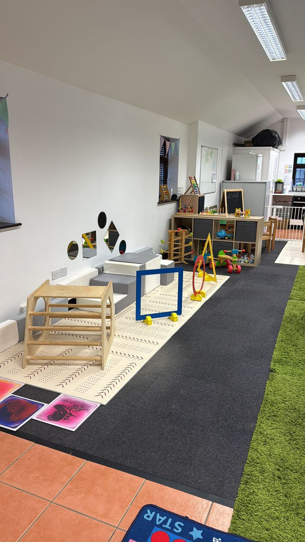 Open play space with climbing frame in The Little Paddocks