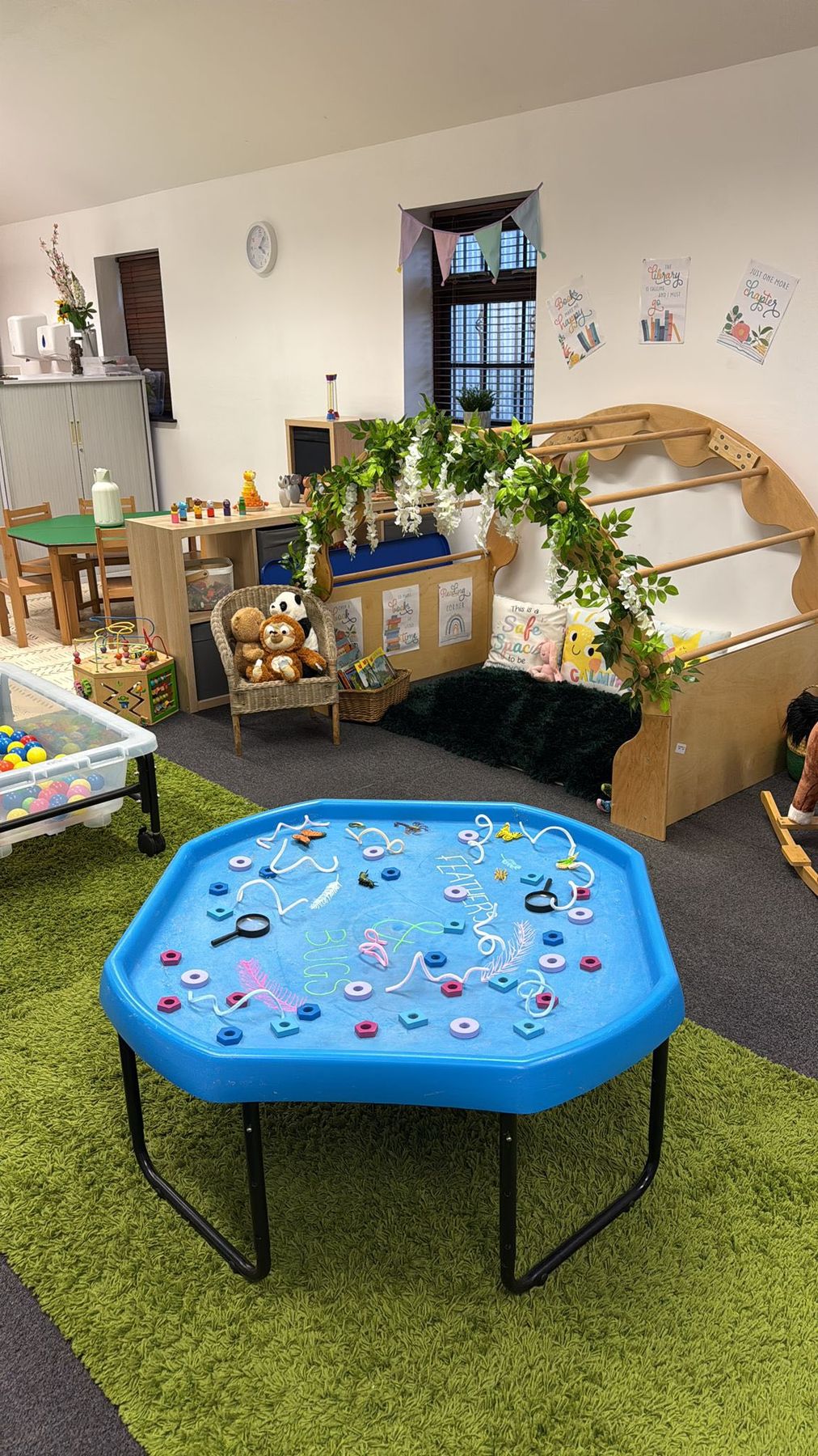 Water tray play set up beside the garden door
